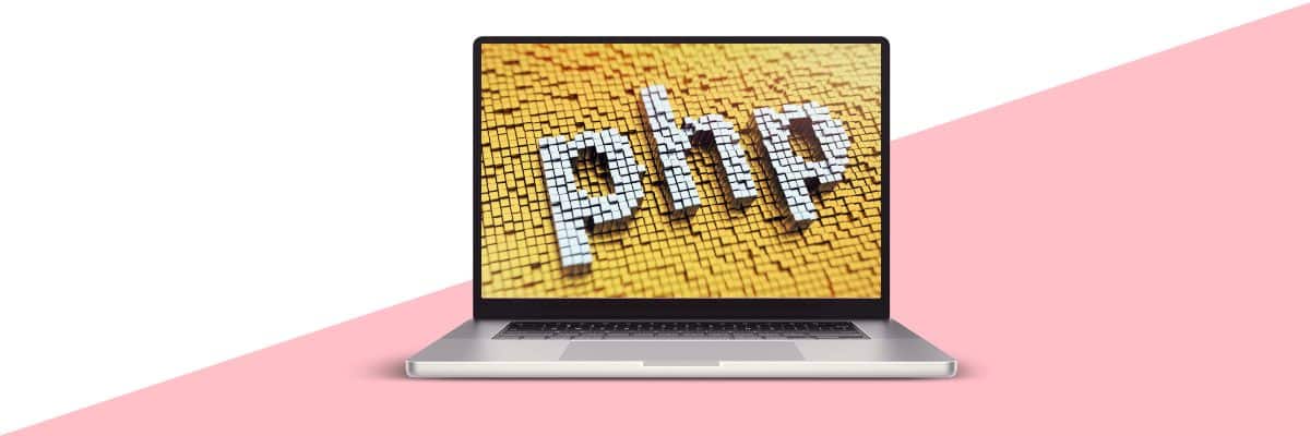 a laptop with a screen showing the word php